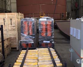 Hydraulic jacking equipment with lifting hooks for tank erection eliminates the need to temporarily weld lifting cleats to the tank shell