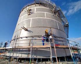 Welding of circumferential joints of storage tanks using submerged arc automatic girth welding machine; tank jacking and automatic welding solutions for storage tanks