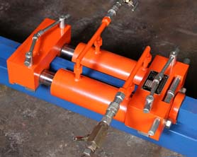12 ton capacity, double acting hydraulic jacks with in-built grip jaws, used for lifting and erecting storage tanks