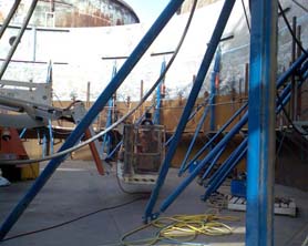 Bygging tank lifting jacks used to add a new shell ring to an existing tank at Queensland Aluminium Ltd. in Gladstone Australia