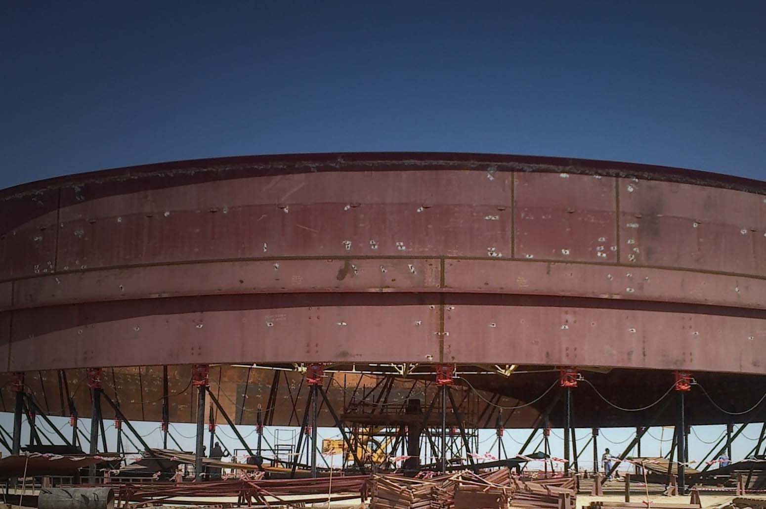 Storage tank lifting and welding; hydrualic jacks for tank construction and tank repair